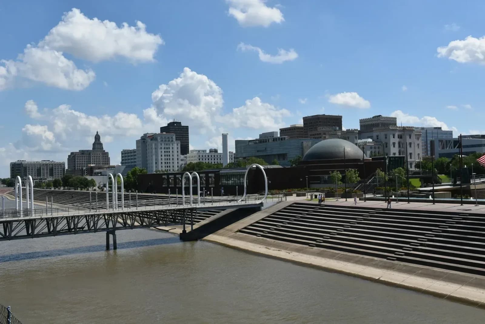 Downtown Baton Rouge skyline and Mississippi riverfront steps with the Louisiana State Capitol