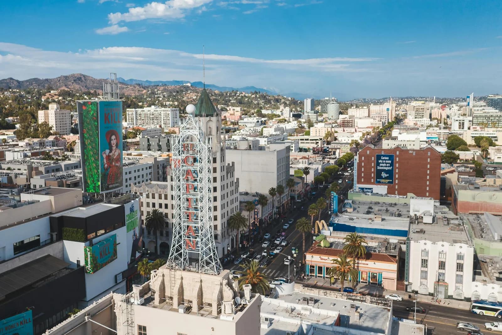 Aerial view of the vibrant cityscape of Hollywood, featuring famous landmarks and bustling streets.