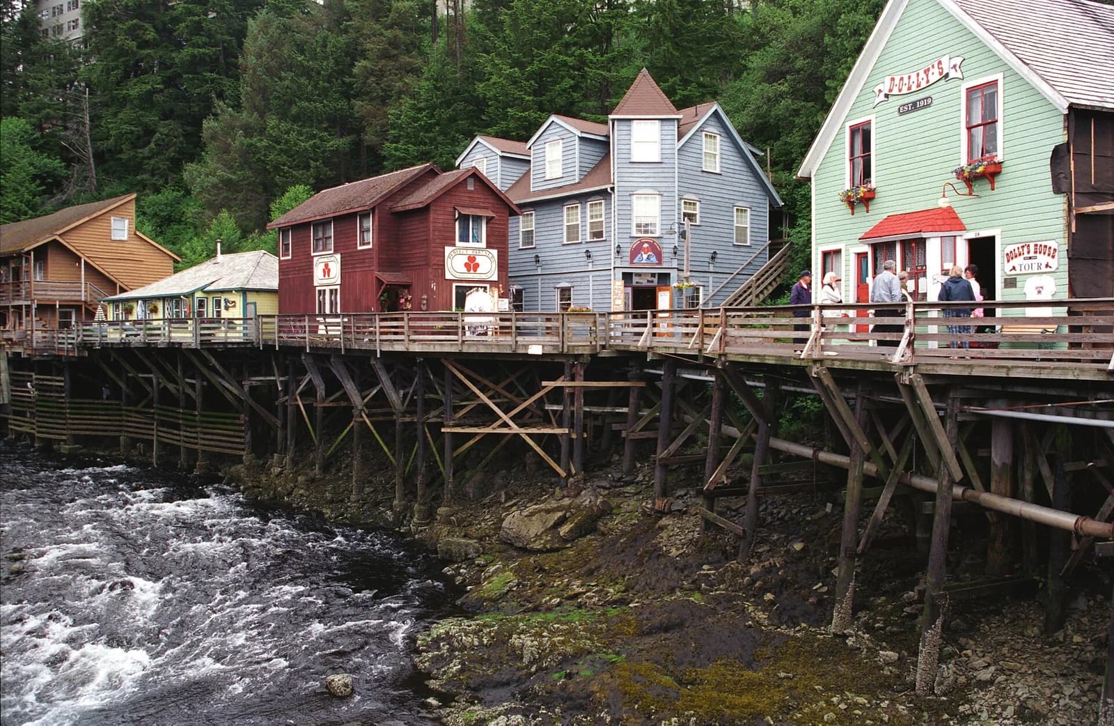 The historic boardwalk shops of Creek Street in Ketchikan, Alaska above the creek
