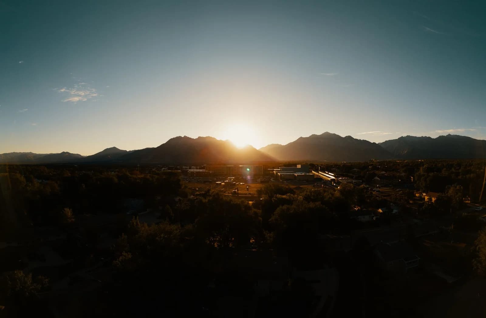 Stunning sunset view showcasing the silhouette of mountains in Sandy, Utah.